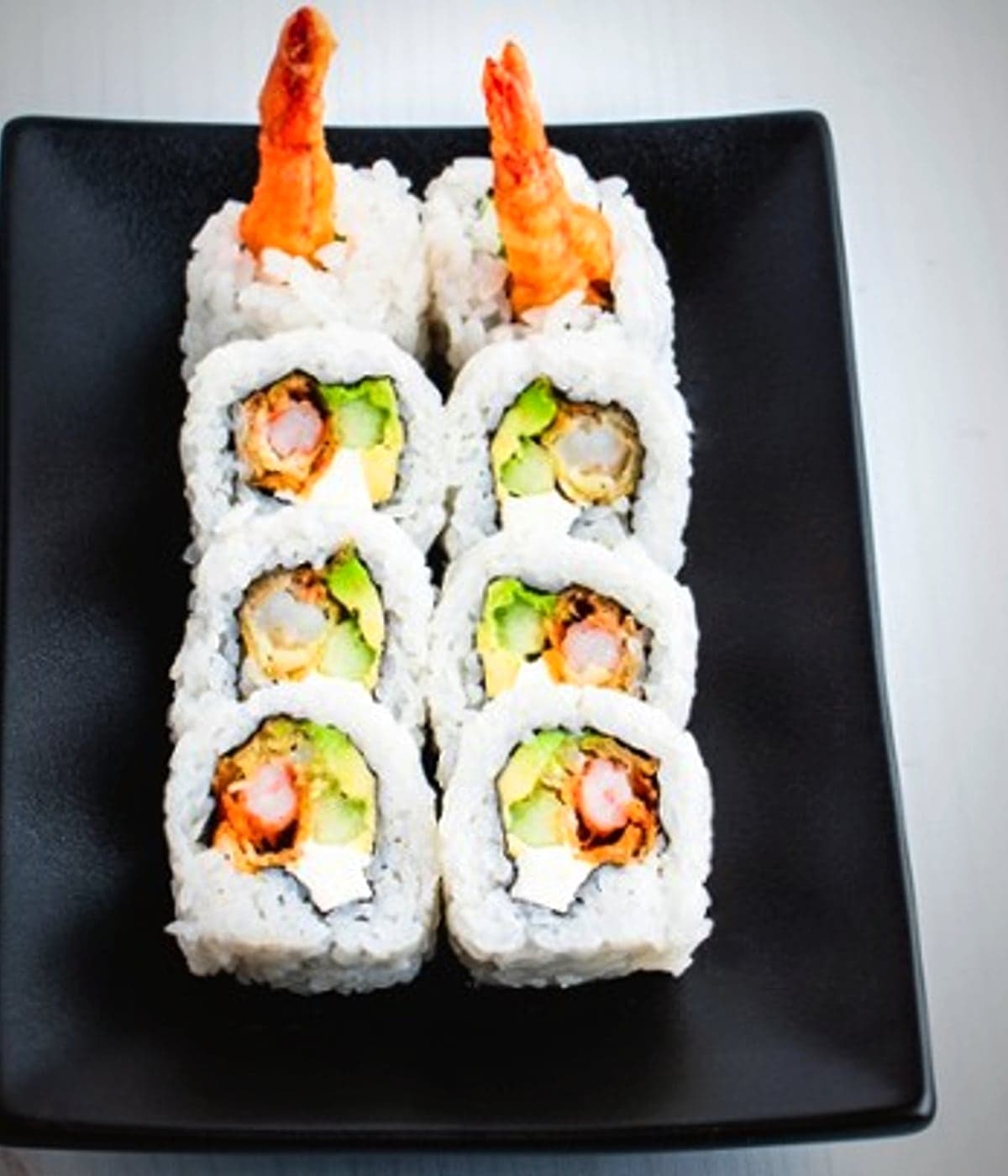 The Volcano roll at Daisuki Sushi, baked and topped with a warm spicy sauce.